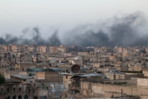 Smoke rises after airstrikes on the rebel-held al-Sakhour neighborhood of Aleppo, Syria, on Friday.