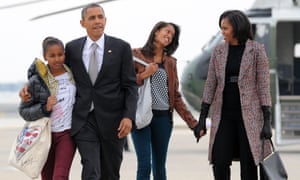 Michelle and Barack and their daughters Malia and Sasha board Air Force One