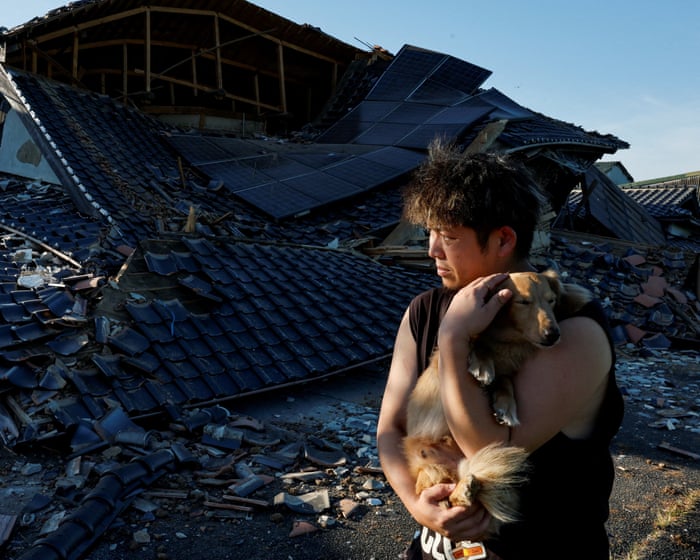 Japan’s prime minister tours earthquake-hit sites as recovery efforts hampered by soaring temperatures