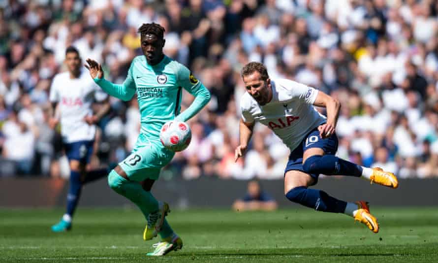 Harry Kane goes down after a challenge from Yves Bissouma in Spurs’ home defeat to Brighton.