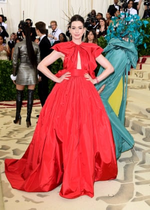 Anne Hathaway was loyal to one of her favourite houses, with her sweeping Valentino Haute Couture gown coming in the fashion house’s signature red. Keeping with the theme, her head decoration was part halo, part crown of thorns.