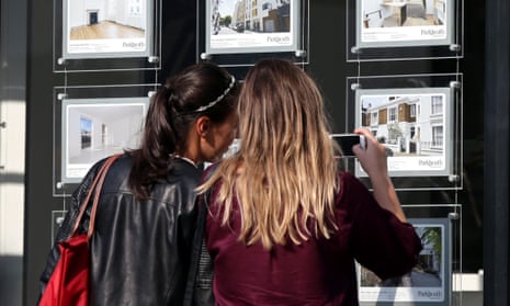 Stamp duty impact on housing marketFile photo dated 08/06/16 of two young women studying houses for sale in an estate agent’s window. The “stifling” effect of stamp duty on the housing market means an extra 146,000 property sales could have taken place over the last five years if home movers had not been faced with the tax, a report has estimated. PRESS ASSOCIATION Photo. Issue date: Wednesday November 15, 2017. Despite reforms to stamp duty in recent years, it remains “inefficient”, the report argues, fuelling housing shortages, making homes less affordable and putting people off moving to more suitable properties - from those taking early steps on the housing ladder to older home owners. See PA story MONEY Stamp. Photo credit should read: Yui Mok/PA Wire