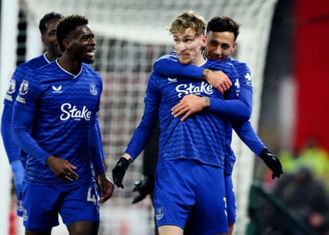 Everton's James Garner celebrates with teammates after scoring the opening goal at Nottingham Forest.
