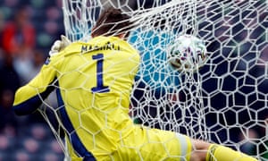 David Marshall crashes into the back of the net as he tries in vain to stop Patrick Schick's long-range lob.