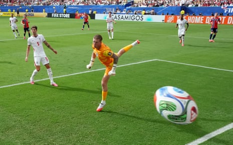 Jordan Pickford in action as Norway's Andreas Schjelderup scores their first goal