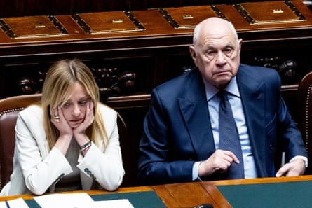 Meloni and Carlo Nordio look downcast in parliament
