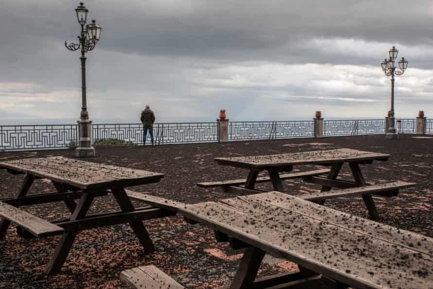 Volcanic sand covers a square in Milo, one of the village most affected by the phenomenon of the fall of ash from Etna. Milo is a village not far from the top of the volcano.