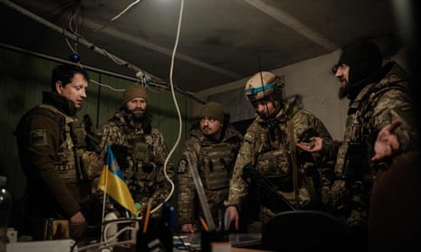 Ukrainian servicemen of the state border guard service work in the operations room in Bakhmut on 9 February.