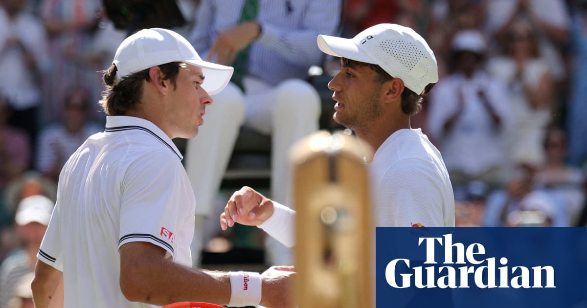 Flavio Cobolli and Alex de Minaur competing on Court One at Wimbledon