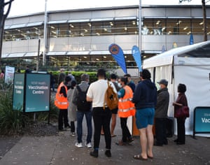 A queue forms outside at a mass COVID-19 vaccination hub in Sydney, Monday, May 10, 2021.