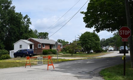 Street sign is seen as the house of 20-year-old Thomas Matthew Crooks, the suspected shooter who attempted to assassinate former President Donald Trump is cornered off with crime scene tape and guarded by law enforcement.