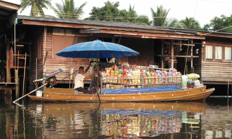 Bangkok’s canal districts are still served by floating corner shops.