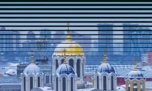 The dome's of St Volodymyr's Cathedral are seen against the city skyline on January 28, 2022 in Kyiv, Ukraine