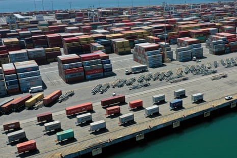 Containers are seen on a shipping dock in the port of Los Angeles, California.
