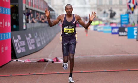 Alexander Munyao crosses the finish line to win the men’s elite race at the 2024 London Marathon