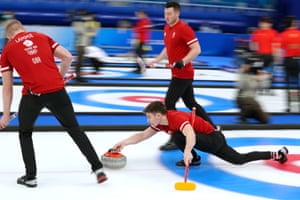 Winter Olympics day six: Johaug wins second gold, ice hockey and more – live! - The Guardian 4 Team Gb’s Grant Hardie releases a stone on the way to victory over Italy.