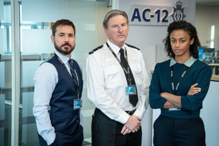 Jed Mercurio’s Line of Duty. Pictured here in the fictional anti-corruption unit AC-12 (from left) DS Steve Arnott (Martin Compston), Superintendent Ted Hastings (Adrian Dunbar) and DC Chloe Bishop (Shalom Brune-Franklin).