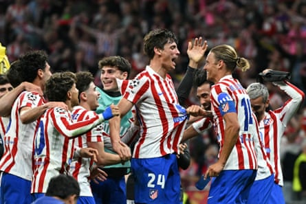 Atlético Madrid defender Robin Le Normand and teammates celebrate after beating Barcelona