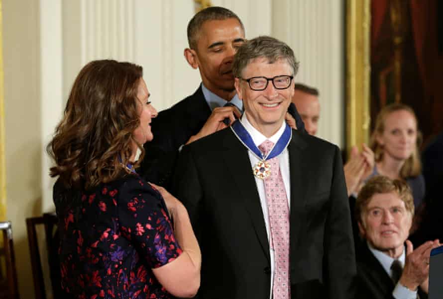 Bill and Melinda Gates receiving Presidential Medals of Freedom from Barack Obama in 2016.