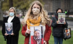 Jo Goodman, who lost her father Stuart, 72, to Covid-19 stands with other families bereaved by the virus outside parliament.