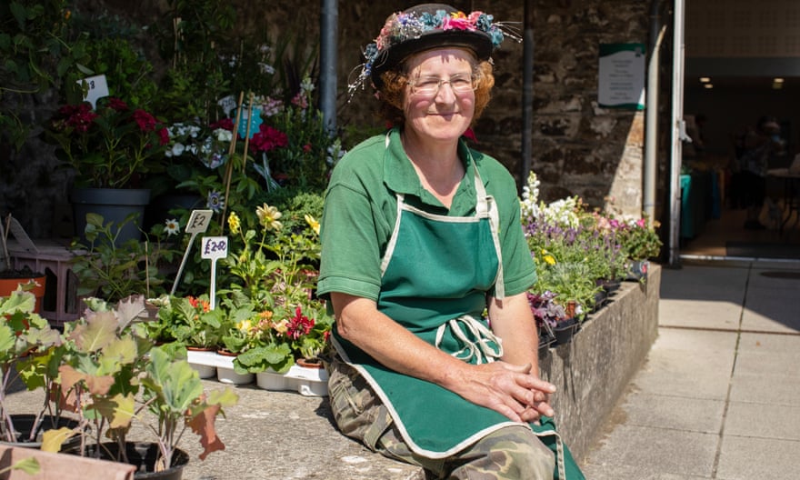 Helen Lessiter at her flower and plant stall on Fishguard Market, Wales.