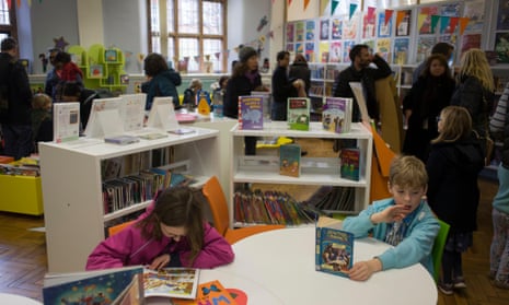 Interior of Carnegie Library, including children reading books