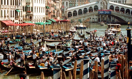 Hundreds of gondolas on Venice’s main Canal Grande waterway, close to the Rialto Bridge.