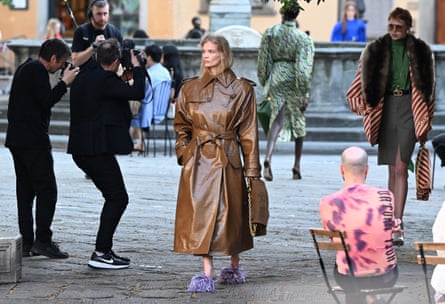 A model presents a piece from Gucci’s cruise 2026 collection in Piazza Santo Spirito in Florence.