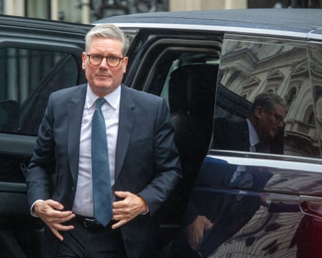 Keir Starmer stepping out of a vehicle in Downing Street