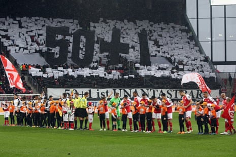 Fans of VfB Stuttgart demonstrate support for the 50+1 rule
