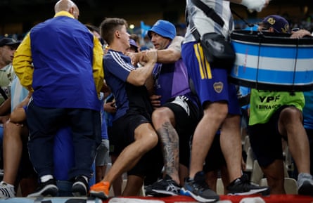 Argentina fans fighting to get a front-row standing position before kick-off in the semi.