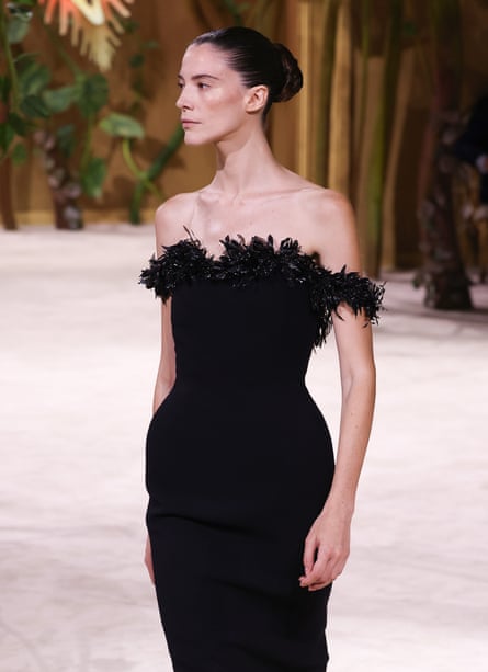 Model wearing black ‘revenge’ dress
