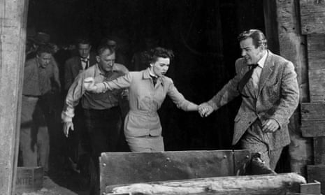 Barbara Rush with Richard Carlson (right) in It Came from Outer Space.