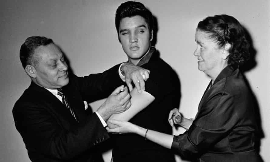 Elvis Presley being vaccinated backstage at ‘The Ed Sullivan Show’ in New York in 1956.