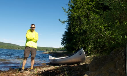 The author Dixe Wills with a Canadian canoe