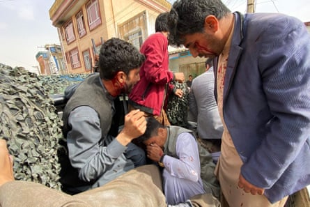 Wounded journalists after the bomb attack in Mazar-i-Sharif at an event commemorating the media on 11 March 2023