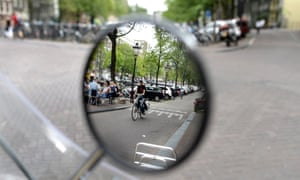 Much of Amsterdam’s road and parking space remains allocated to cars.