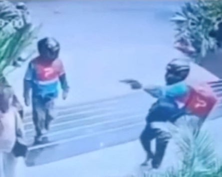 CCTV still showing shooting by two men dressed as delivery riders of Nadia Beller