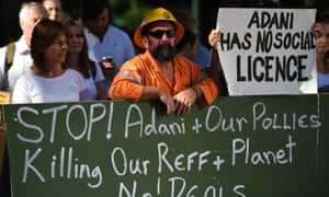 Activists protest against Adani’s proposed Carmichael coalmine outside Parliament House in Brisbane last week. 