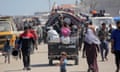 Palestinians who fled Rafah in the south arrive in Deir el-Balah in central Gaza. A senior US official has said a ‘total’ Israeli victory over Hamas is neither likely nor possible. Follow live updates. 
