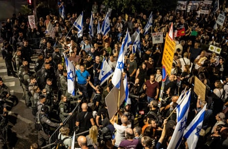 Security forces block Israeli demonstrators during an anti-government protest in Jerusalem on November 4, 2023, amid the ongoing battles between Israel and the Palestinian group Hamas.
