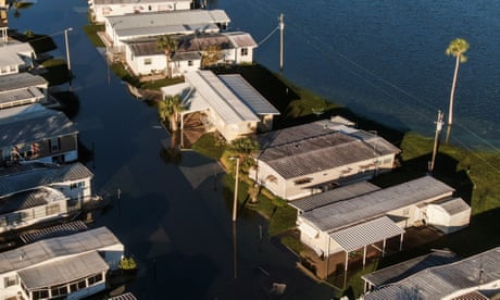 Hurricane Ian aftermath in Florida<br>epa10219341 An aerial photo made with a drone shows homes surrounded with floodwaters in the wake of Hurricane Ian in South Daytona Beach, Florida, 02 October 2022. The category 4 storm made land fall 28 September causing widespread damage and power outages. EPA/TANNEN MAURY