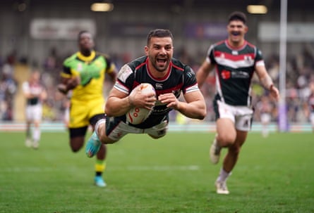 Lebanese Josh Mansour dives to score an attempt against Jamaica.