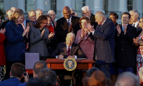 US president Joe Biden signs the Infrastructure Investment and Jobs Act at the White House in Washington.