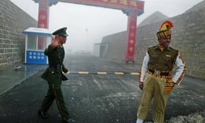 Chinese and Indian soldiers at the Nathu La border crossing between India and China in India’s north-eastern Sikkim state.