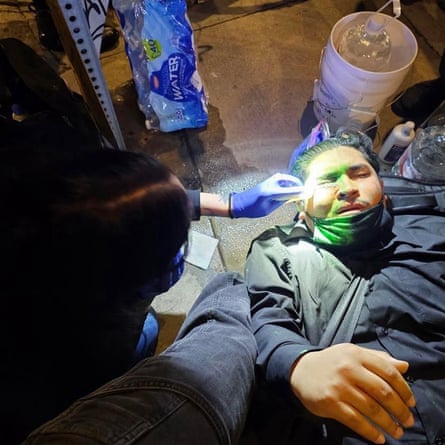 Person receiving help from other people