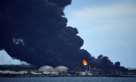 Oil storage tanks burn in the Matanzas supertanker base.