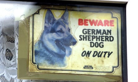 sign says ‘beware, german shepherd dog on duty’