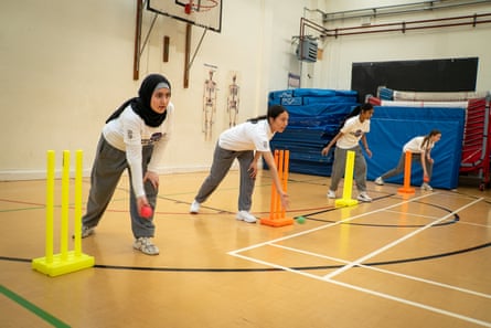 Pupils from the Grey Coat Hospital school in Westminster practising their cricketing skills.