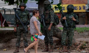 Soldiers on patrol in Rio de Janeiro, where the military have controversially taken control of security.